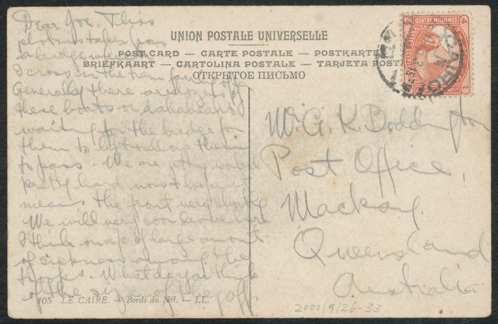 Reverse side of postcard with handwritten message (transcribed in main text) and addressed to Mackay, Queensland. The postcard is stamped and postmarked 'CAIRO'.